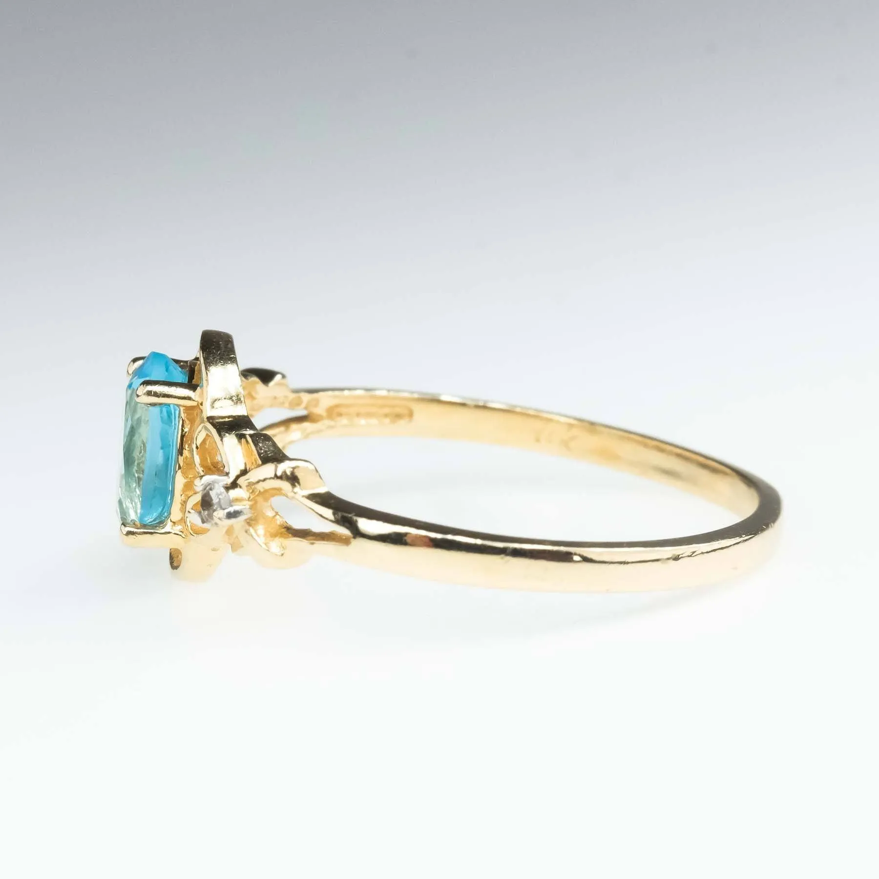 0.94ct Swiss Blue Topaz with Diamond Accents Gemstone Ring in 14K Yellow Gold