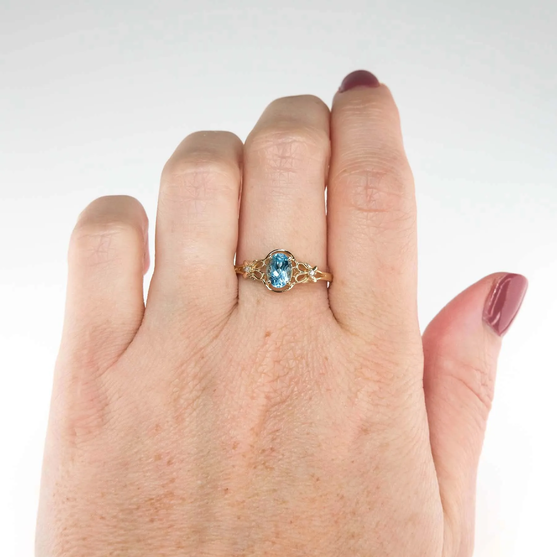 0.94ct Swiss Blue Topaz with Diamond Accents Gemstone Ring in 14K Yellow Gold