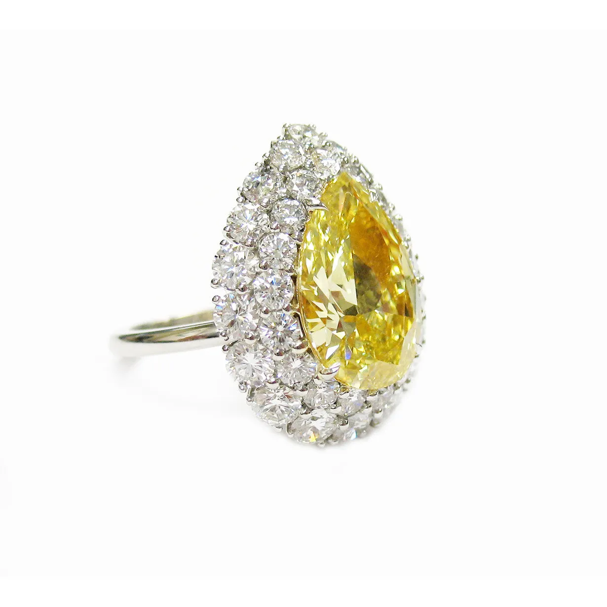 1980s Platinum Yellow Diamond Ring